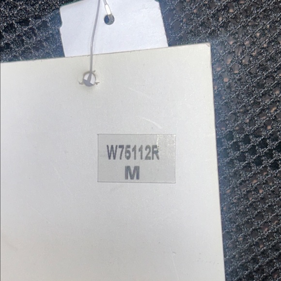 Elegant Black Dress with Floral Accents - Picture 7 of 13